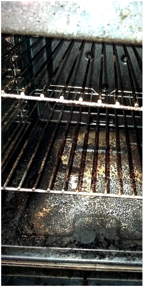 Grimy oven interior before The Complete Cleaning