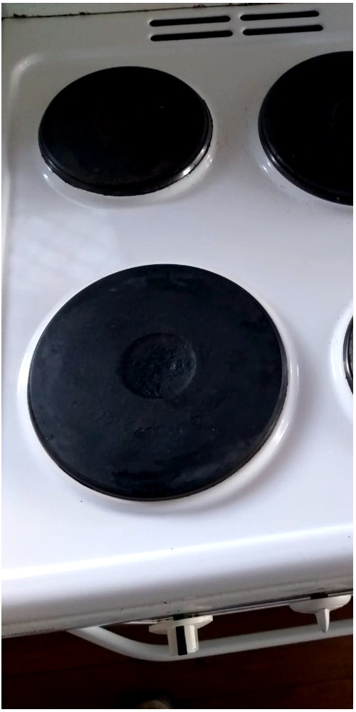 Spotless stovetop after The Complete Cleaning